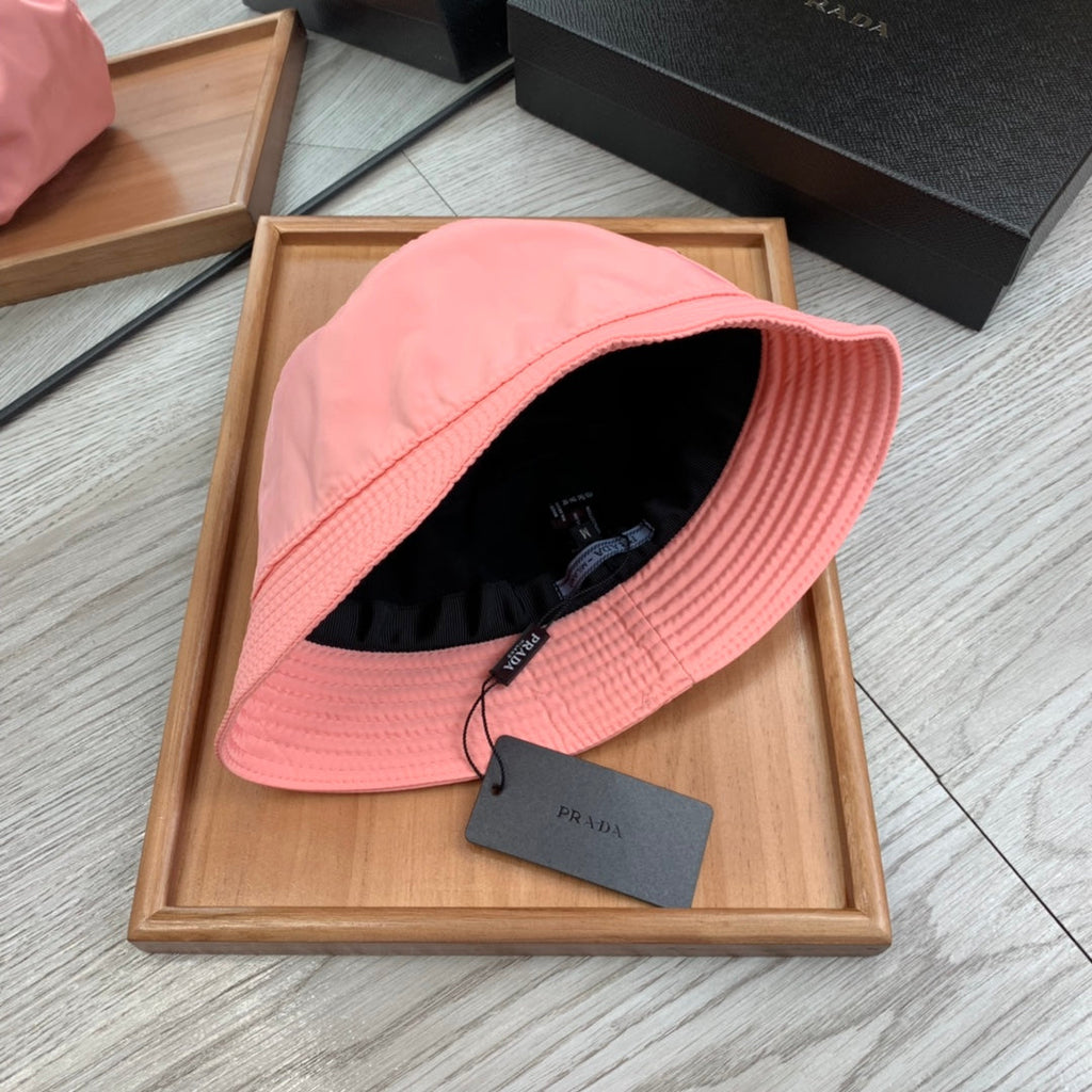 PRADA BUCKET HAT IN ROUGE PINK RE-NYLON 234103