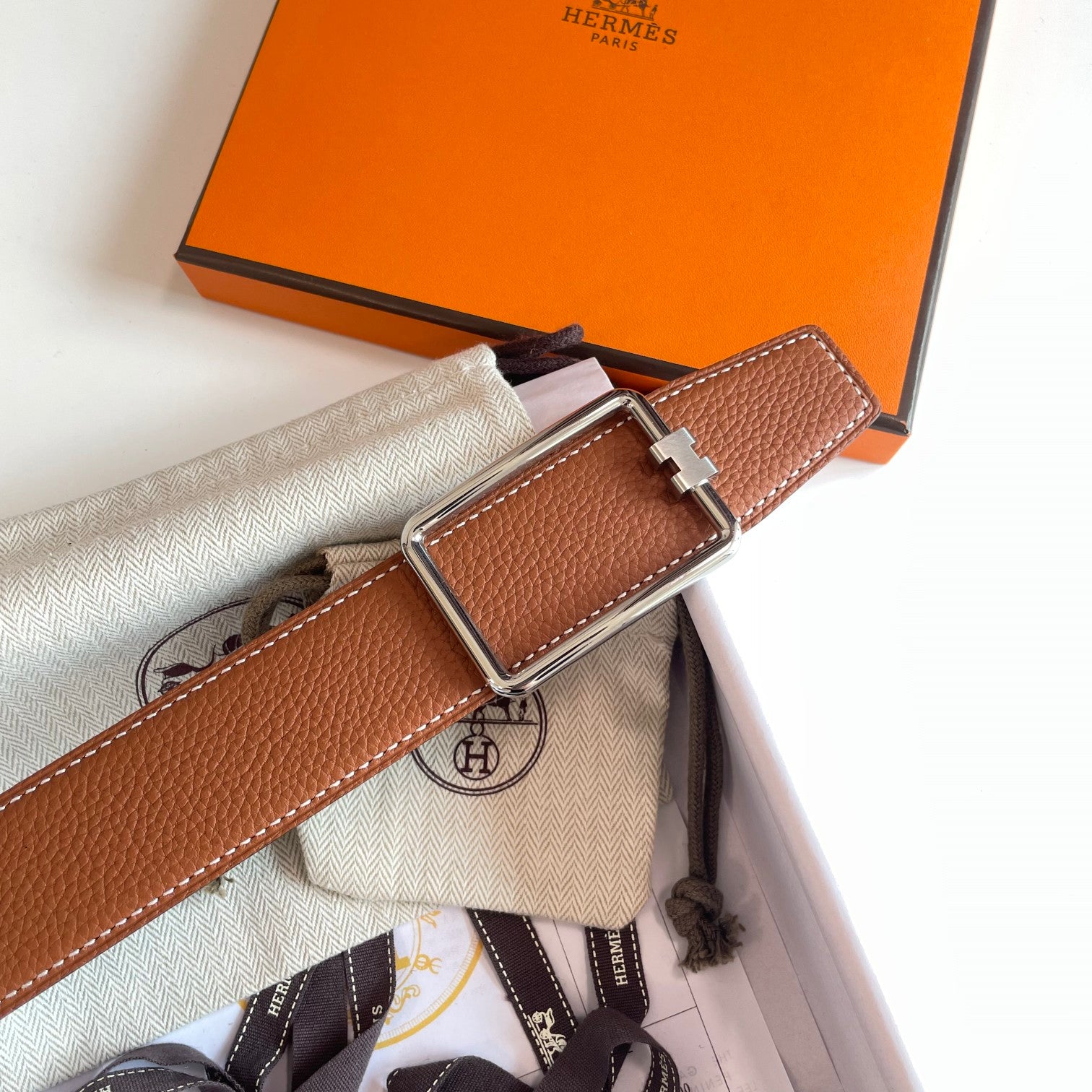 HERMES TUBE H BELT BUCKLE & REVERSIBLE BLACK AND CINNAMON BROWN LEATHER STRAP 38MM SILVER  HARDWARE