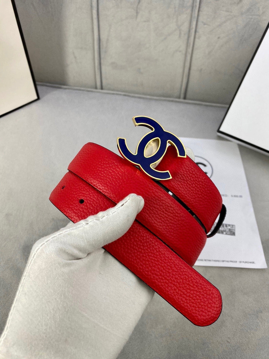 CHANEL 30MM BELT IN CHERRY RED GRAINED CALFSKIN WITH NAVY BLUE METAL LOGO