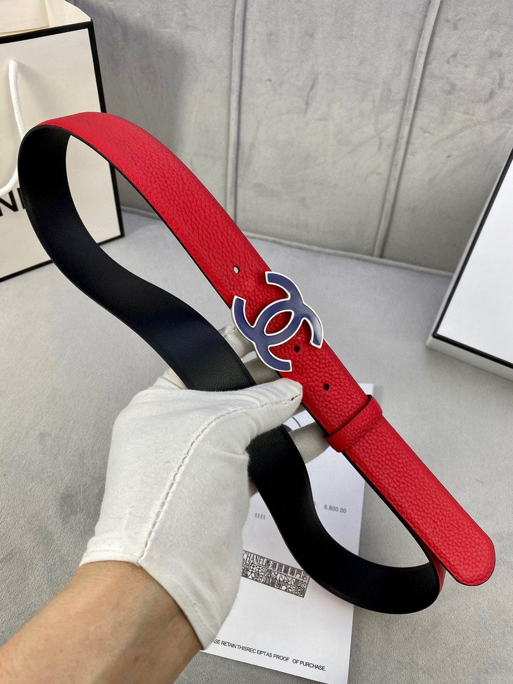 CHANEL 30MM BELT IN CHERRY RED GRAINED CALFSKIN WITH NAVY BLUE METAL LOGO