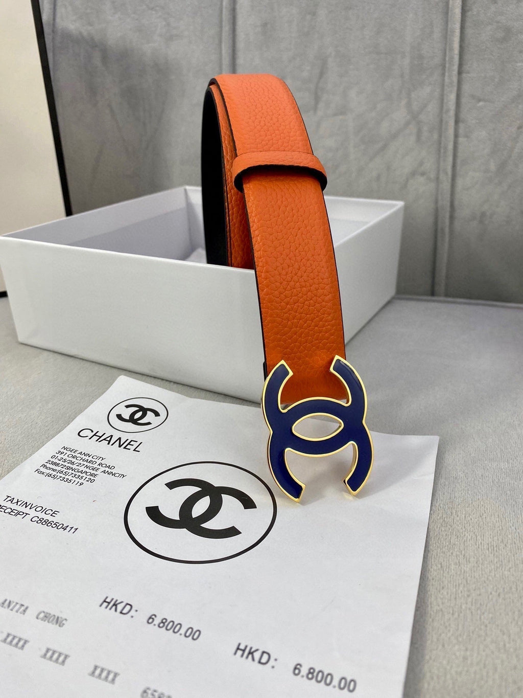 CHANEL 30MM BELT IN FIRE ORANGE GRAINED CALFSKIN WITH NAVY BLUE METAL LOGO