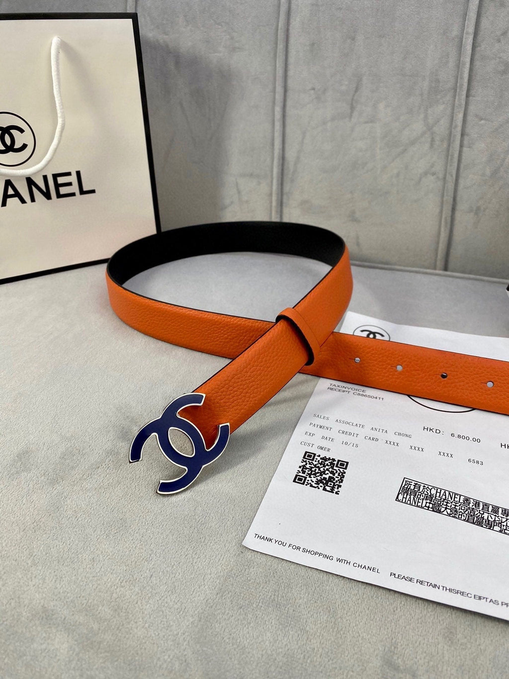 CHANEL 30MM BELT IN FIRE ORANGE GRAINED CALFSKIN WITH NAVY BLUE METAL LOGO