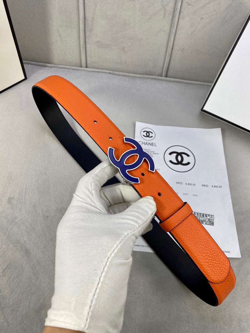 CHANEL 30MM BELT IN FIRE ORANGE GRAINED CALFSKIN WITH NAVY BLUE METAL LOGO