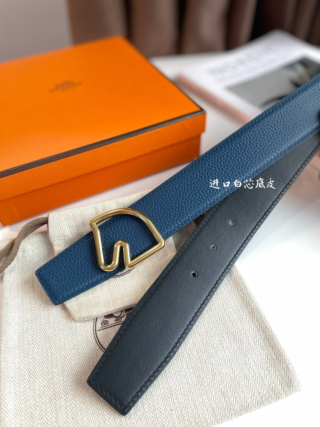 HERMES BOUCLE BELT BUCKLE & REVERSIBLE NAVY BLUE AND BLACK AND WHITE LEATHER STRAP 38MM GOLD HARDWARE