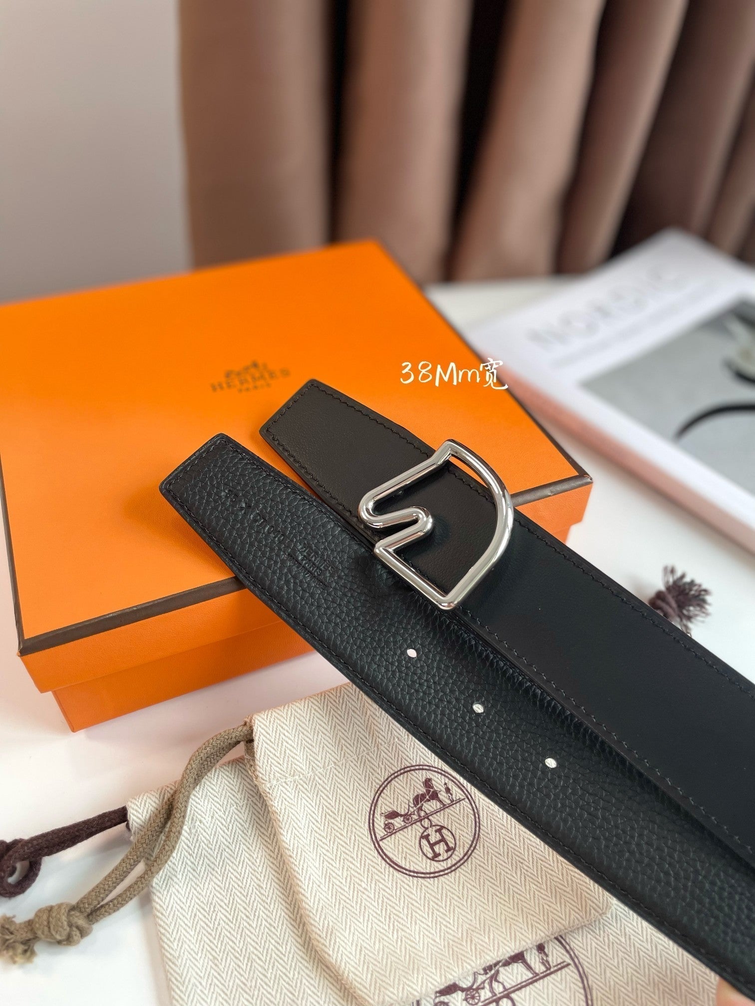 HERMES BOUCLE BELT BUCKLE & REVERSIBLE BLACK AND WHITE LEATHER STRAP 38MM SILVER HARDWARE