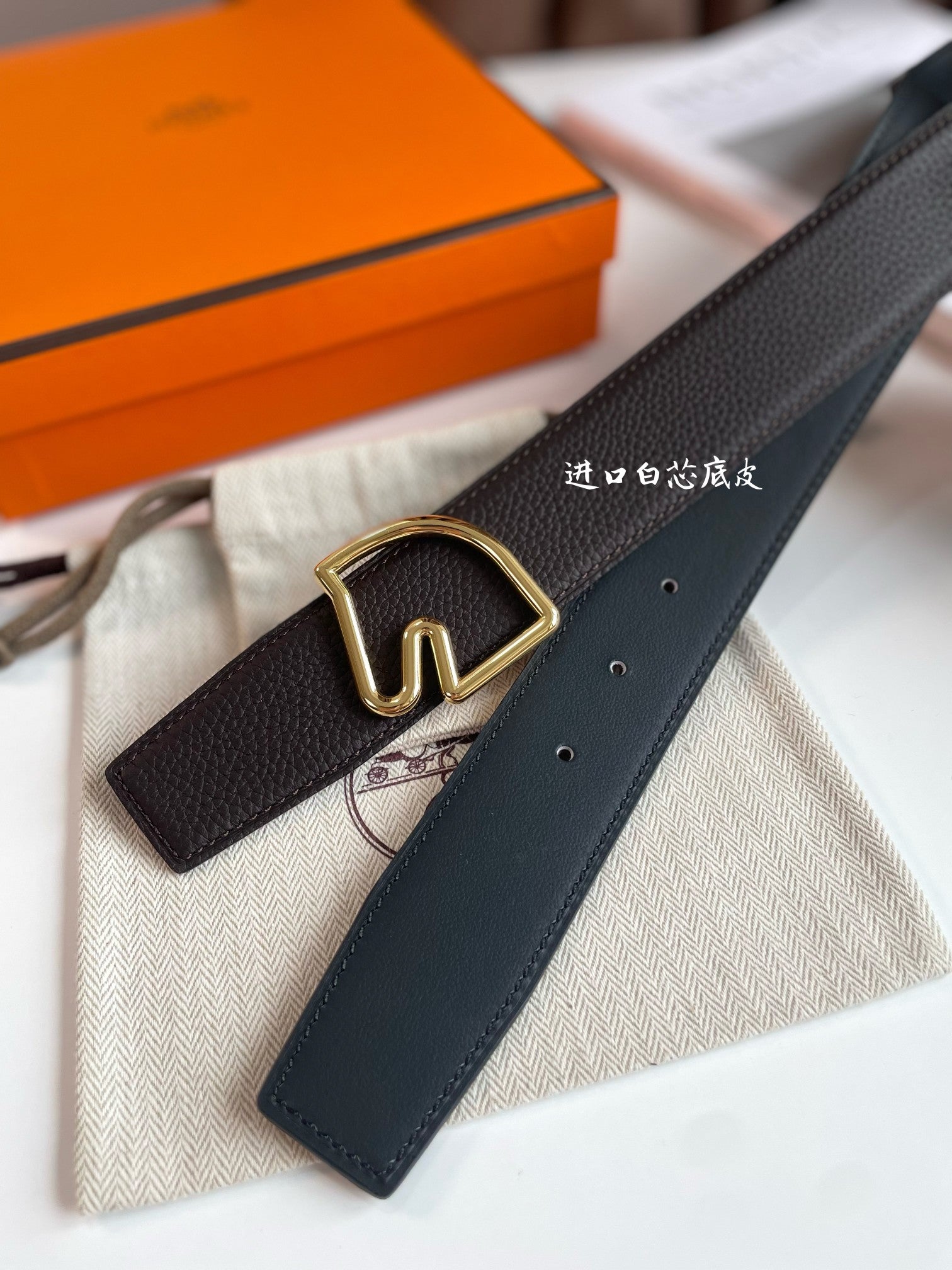 HERMES BOUCLE BELT BUCKLE & REVERSIBLE CHOCOLATE BROWN AND BLACK LEATHER STRAP 38MM GOLD HARDWARE