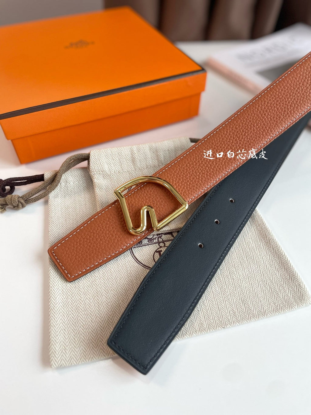 HERMES BOUCLE BELT BUCKLE & REVERSIBLE GINGER ORANGE AND BLACK LEATHER STRAP 38MM GOLD HARDWARE