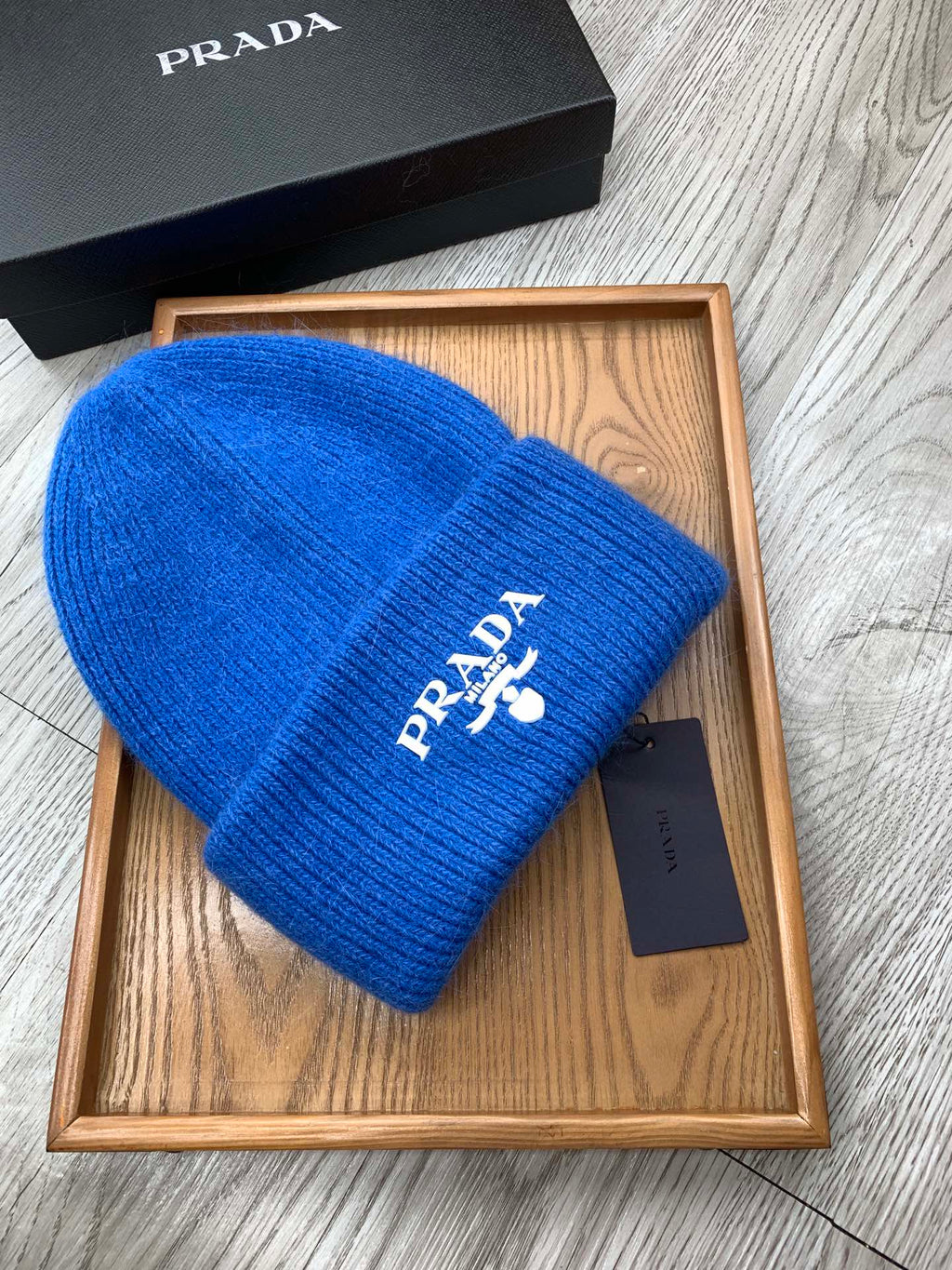PRADA BEANIE HAT IN COBALT BLUE WOOL 108752