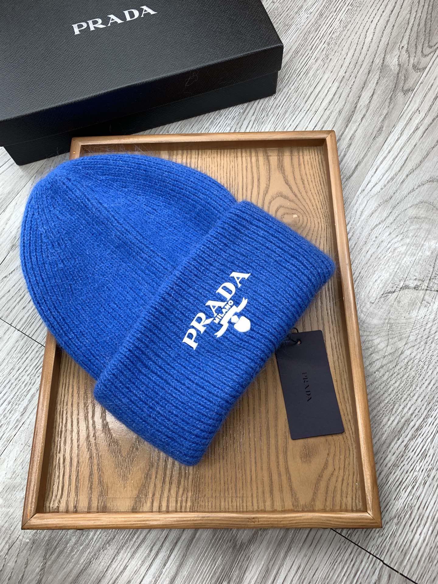 PRADA BEANIE HAT IN COBALT BLUE WOOL 108752