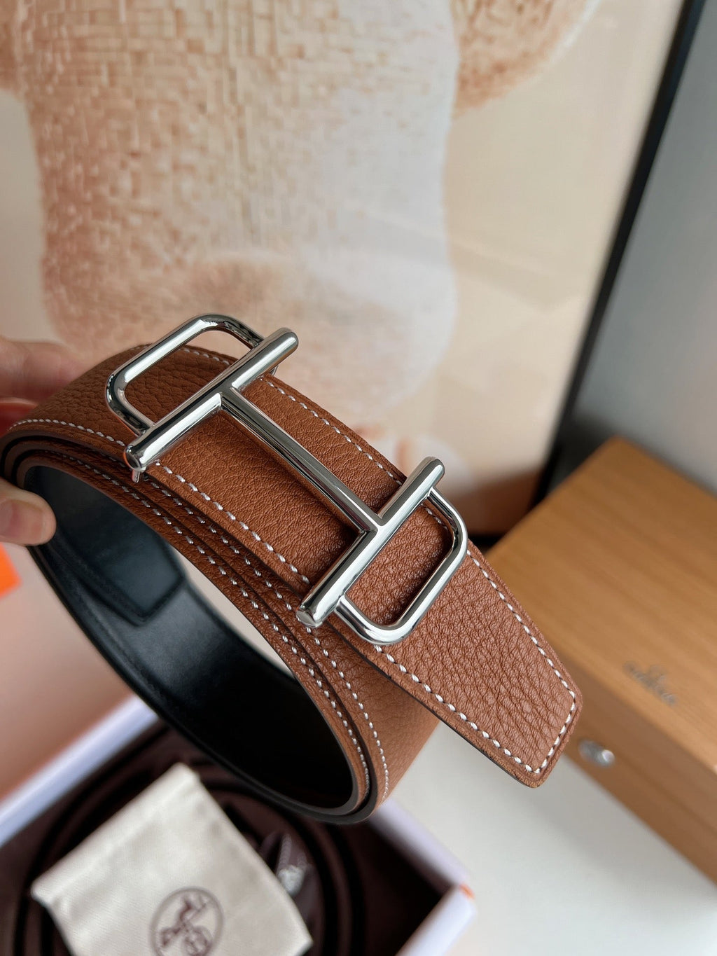 HERMES ROYAL BELT BUCKLE & REVERSIBLE NOIR AND CIDER ORANGE LEATHER STRAP 32 MM SILVER HARDWARE