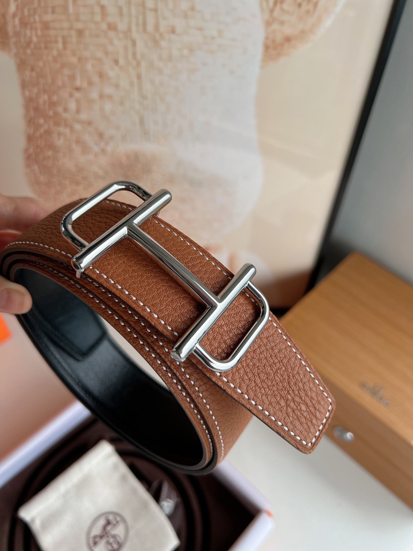 HERMES ROYAL BELT BUCKLE & REVERSIBLE NOIR AND CIDER ORANGE LEATHER STRAP 32 MM SILVER HARDWARE
