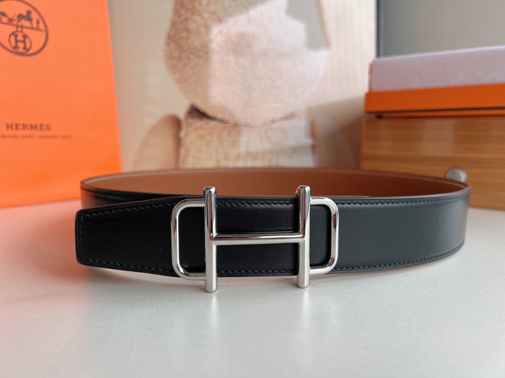 HERMES ROYAL BELT BUCKLE & REVERSIBLE NOIR AND CIDER ORANGE LEATHER STRAP 32 MM SILVER HARDWARE