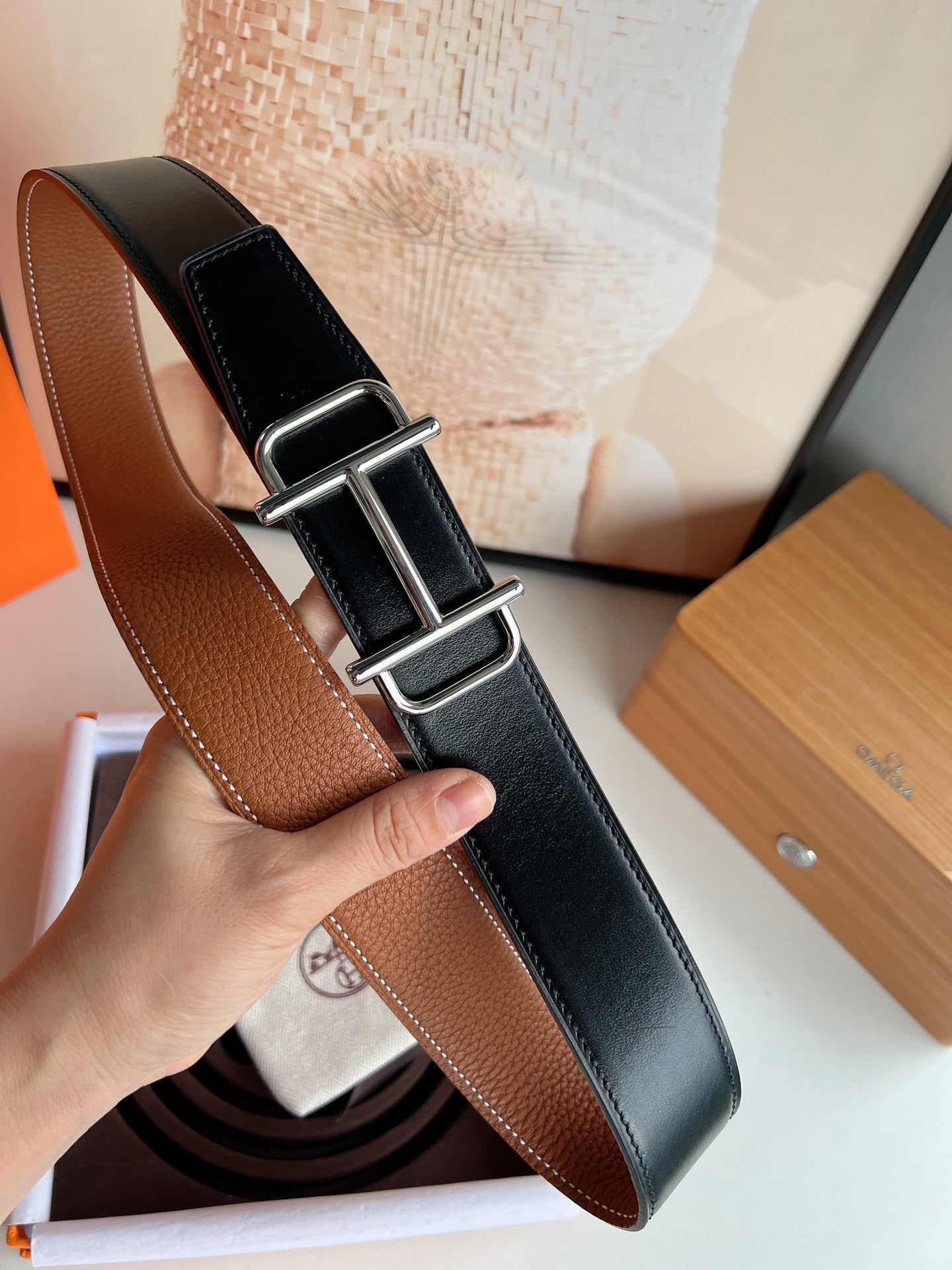 HERMES ROYAL BELT BUCKLE & REVERSIBLE NOIR AND CIDER ORANGE LEATHER STRAP 32 MM SILVER HARDWARE