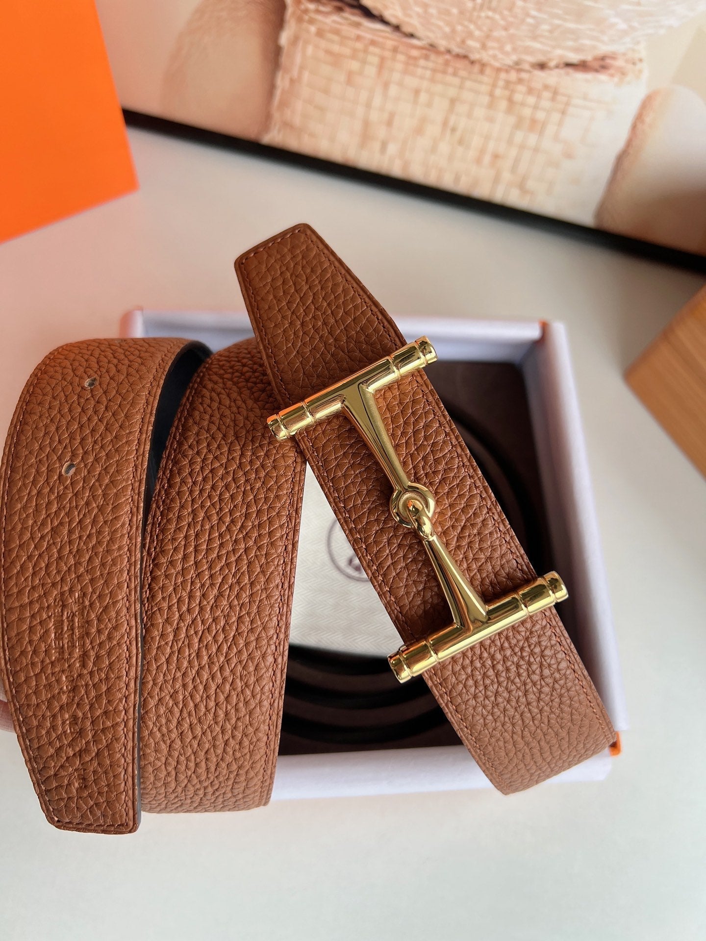 HERMES JUMBO BELT BUCKLE & REVERSIBLE CIDER ORANGE AND BLACK LEATHER STRAP 38 MM GOLD HARDWARE