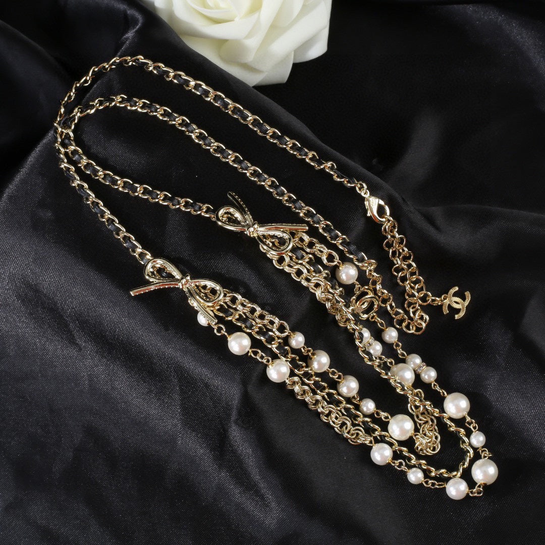 CHANEL 25S GOLD CHAIN BELT WITH PEARL 610440