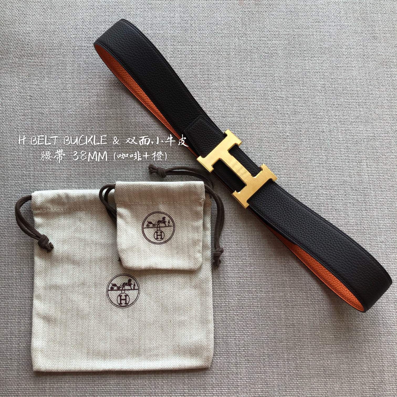 HERMES BELT BUCKLE & REVERSIBLE BLACK AND ORANGE LEATHER STRAP 38MM GOLD HARDWARE