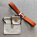 HERMES BELT BUCKLE & REVERSIBLE BLACK AND ORANGE LEATHER STRAP 38MM SILVER HARDWARE