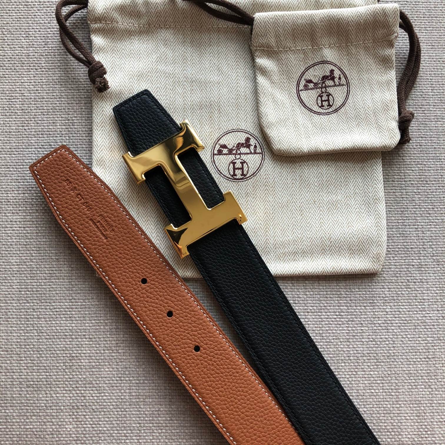 HERMES BELT BUCKLE & REVERSIBLE BLACK AND BRONZE BROWN LEATHER STRAP 38MM GOLD HARDWARE