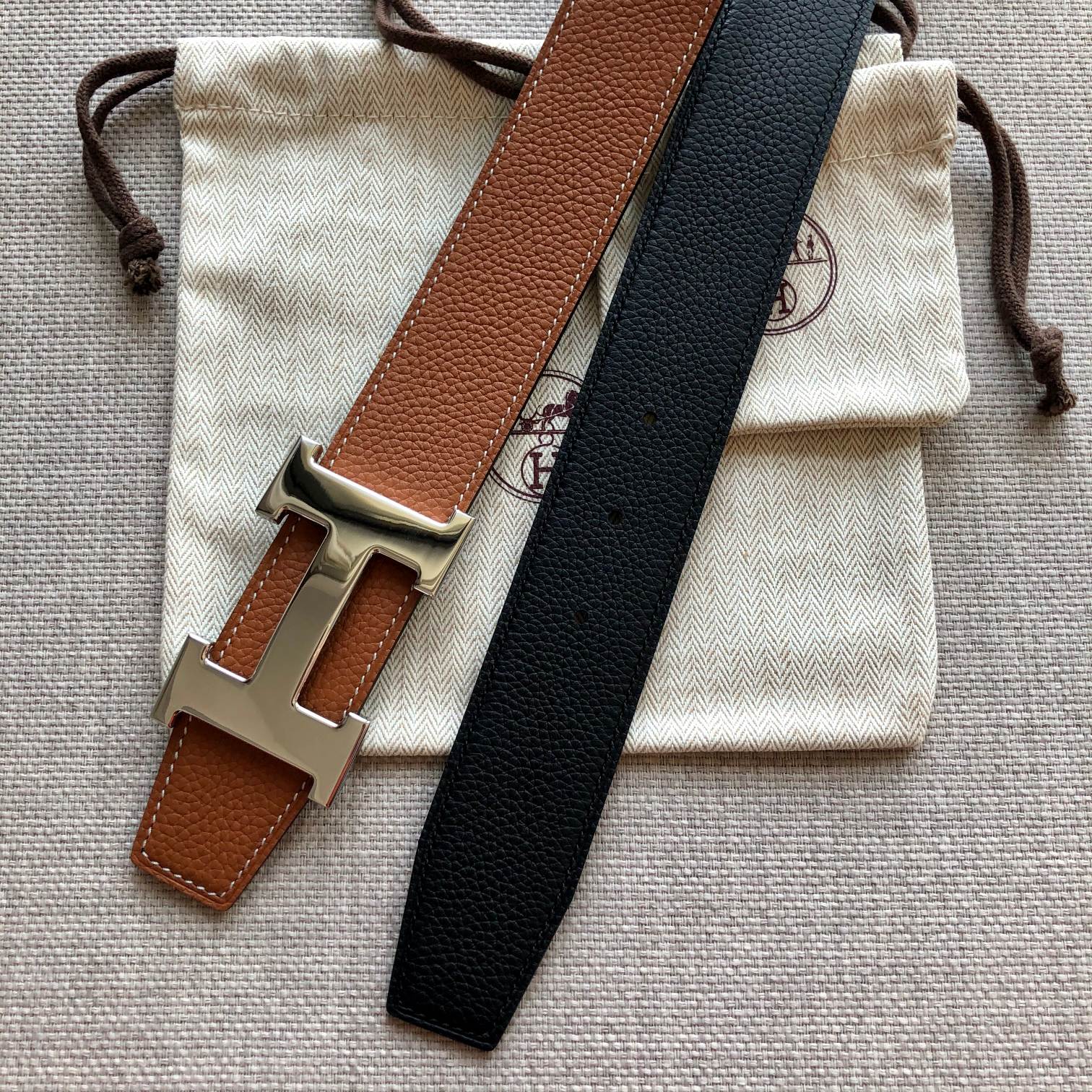 HERMES BELT BUCKLE & REVERSIBLE BLACK AND BRONZE BROWN LEATHER STRAP 38MM GOLD HARDWARE