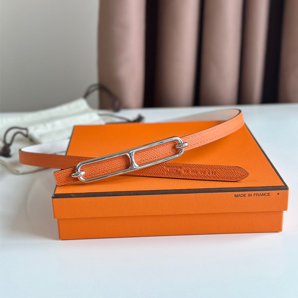 HERMES ROULIS BUCKLE & REVERSIBLE ORANGE AND WHITE LEATHER STRAP 13MM SILVER HARDWARE