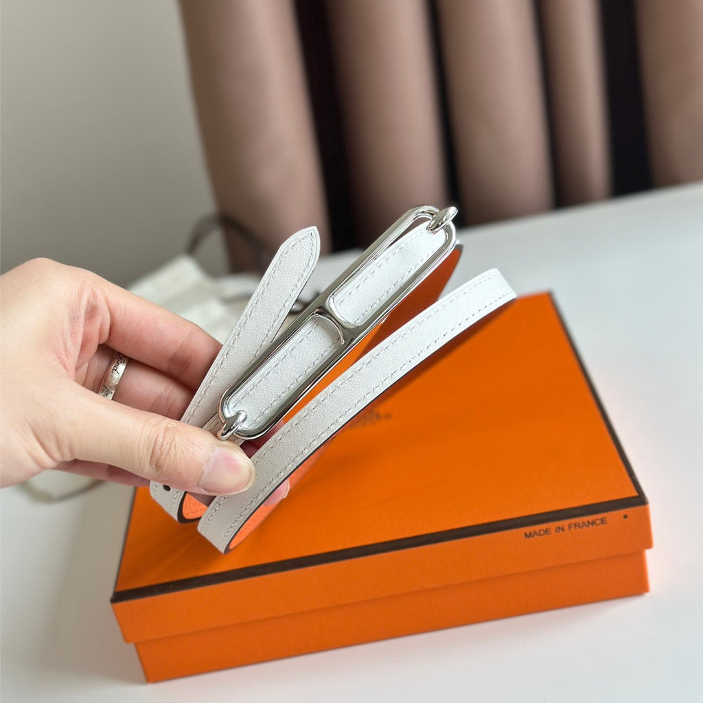 HERMES ROULIS BUCKLE & REVERSIBLE ORANGE AND WHITE LEATHER STRAP 13MM SILVER HARDWARE