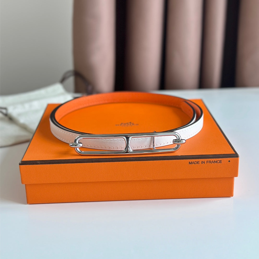 HERMES ROULIS BUCKLE & REVERSIBLE ORANGE AND WHITE LEATHER STRAP 13MM SILVER HARDWARE