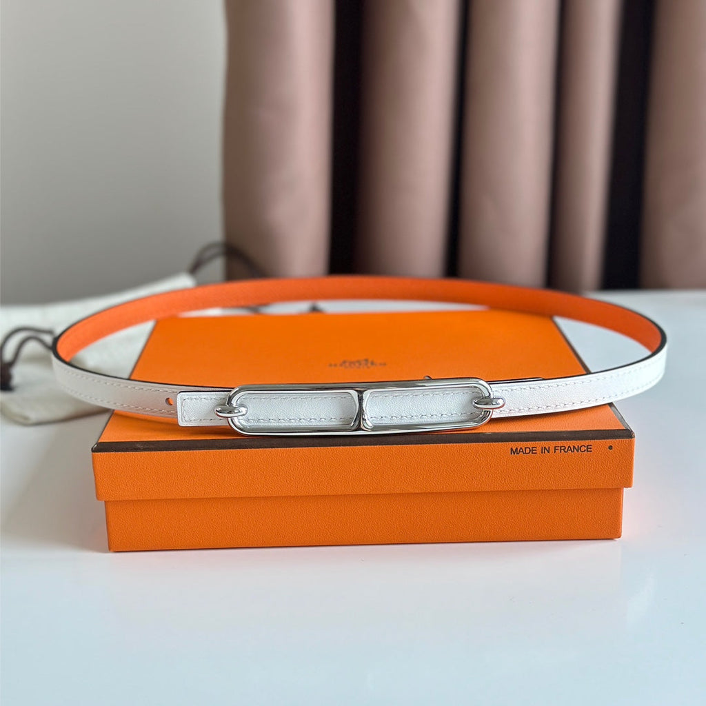 HERMES ROULIS BUCKLE & REVERSIBLE ORANGE AND WHITE LEATHER STRAP 13MM SILVER HARDWARE