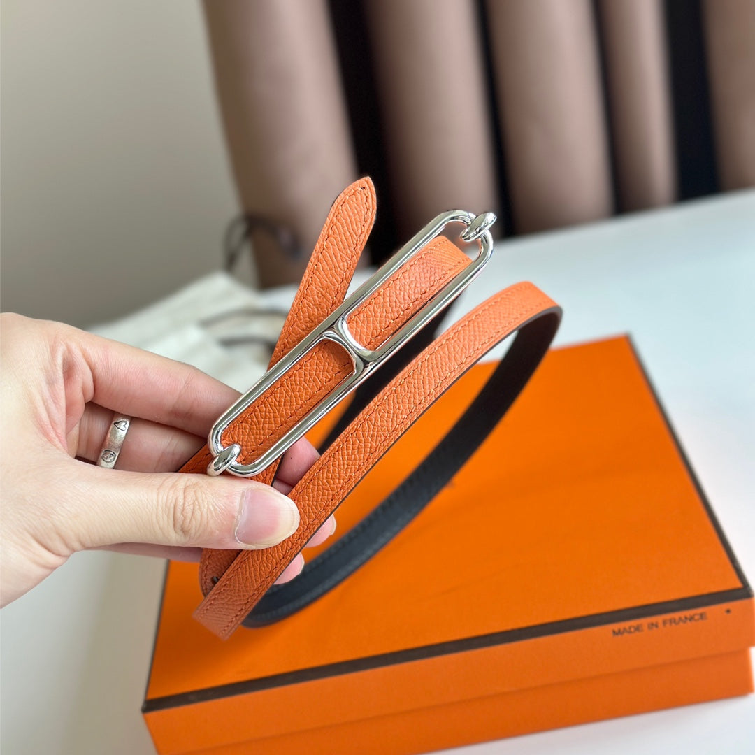 HERMES ROULIS BUCKLE & REVERSIBLE ORANGE AND BLACK LEATHER STRAP 13MM SILVER HARDWARE