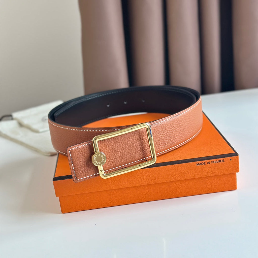 HERMES OSCAR BELT BUCKLE & REVERSIBLE YAM ORANGE AND BLACK LEATHER STRAP 38MM GOLD HARDWARE
