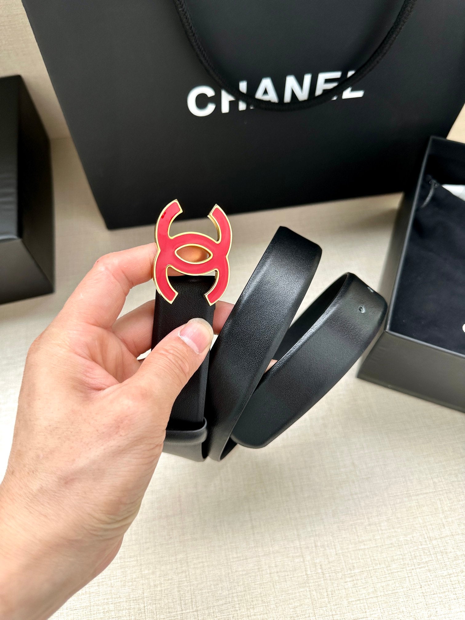 CHANEL 30MM BELT IN BLACK SMOOTH CALFSKIN WITH RED METAL LOGO