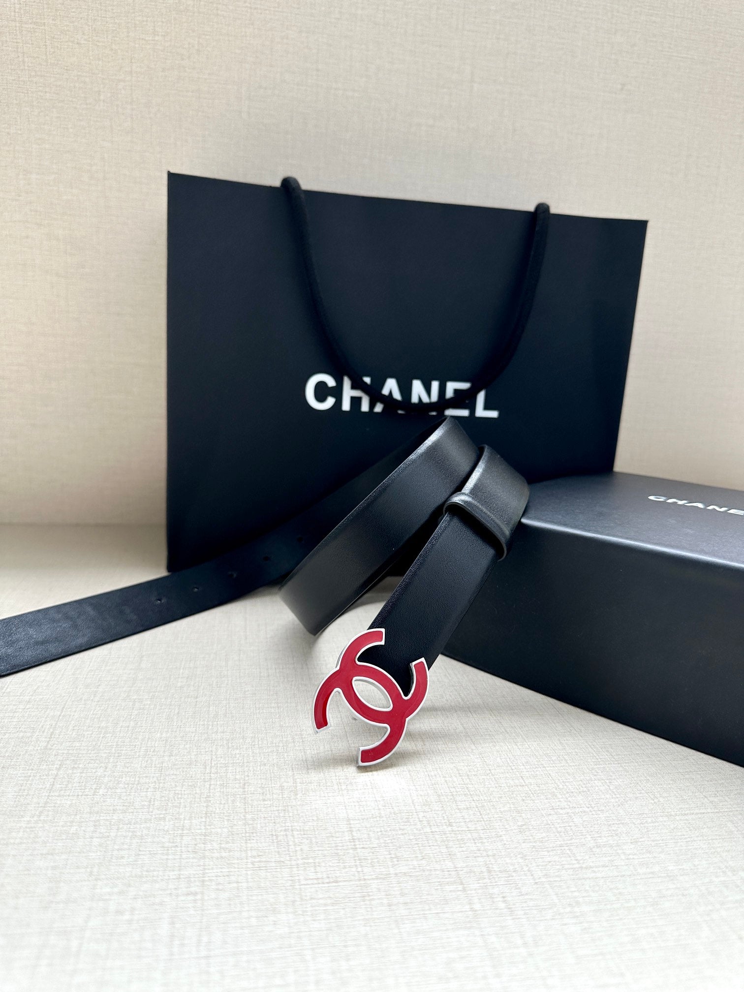 CHANEL 30MM BELT IN BLACK SMOOTH CALFSKIN WITH RED METAL LOGO