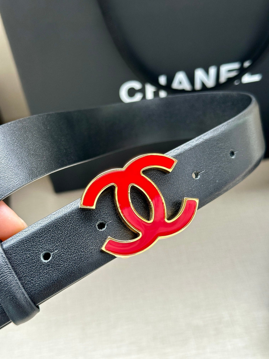 CHANEL 30MM BELT IN BLACK SMOOTH CALFSKIN WITH RED METAL LOGO