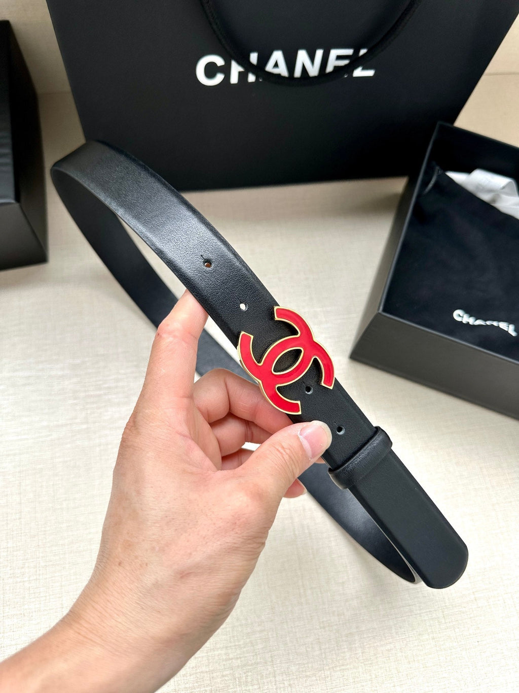 CHANEL 30MM BELT IN BLACK SMOOTH CALFSKIN WITH RED METAL LOGO