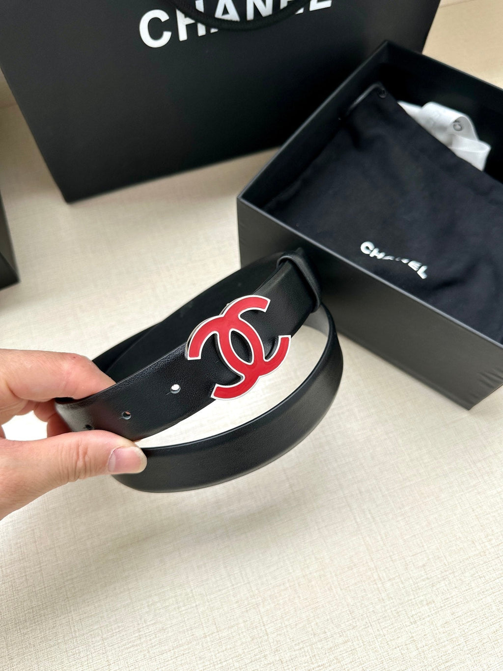 CHANEL 30MM BELT IN BLACK SMOOTH CALFSKIN WITH RED METAL LOGO