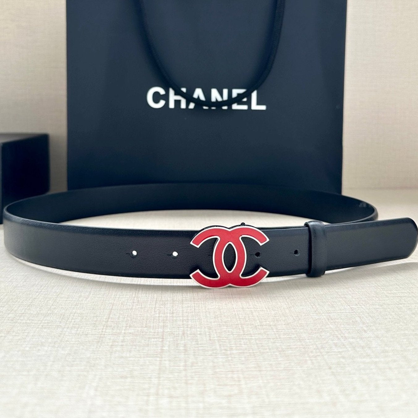 CHANEL 30MM BELT IN BLACK SMOOTH CALFSKIN WITH RED METAL LOGO