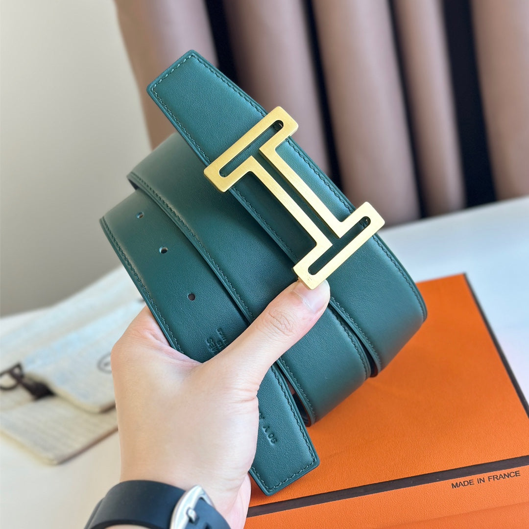 HERMES BELT BUCKLE & REVERSIBLE TEAL GREEN AND BLACK LEATHER STRAP 38MM GOLD HARDWARE