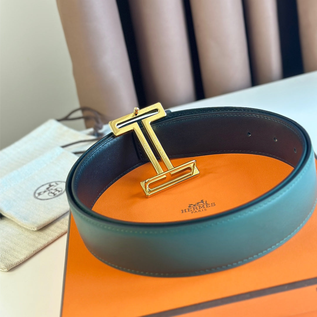 HERMES BELT BUCKLE & REVERSIBLE TEAL GREEN AND BLACK LEATHER STRAP 38MM GOLD HARDWARE