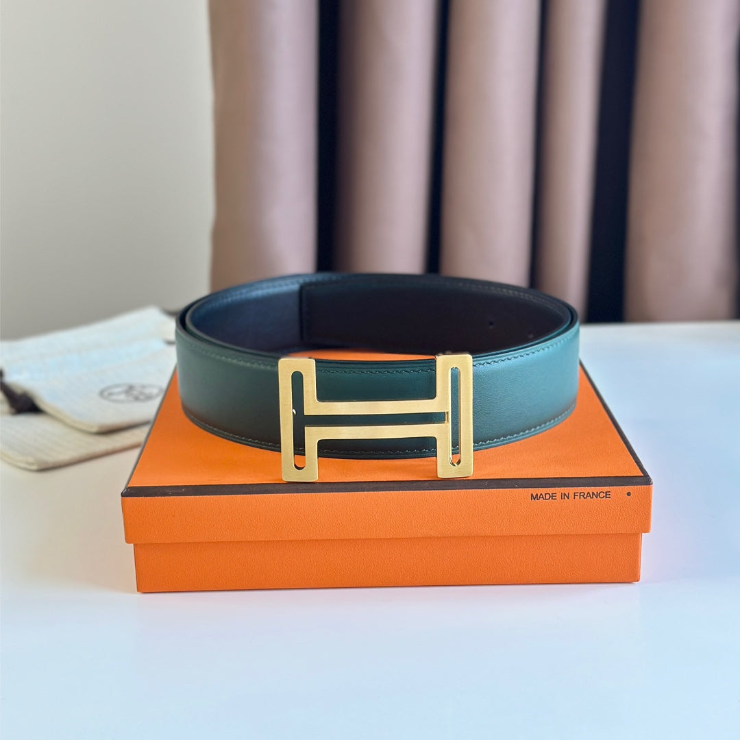HERMES BELT BUCKLE & REVERSIBLE TEAL GREEN AND BLACK LEATHER STRAP 38MM GOLD HARDWARE