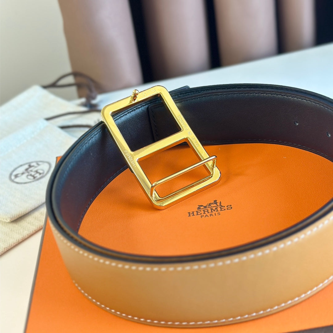 HERMES BELT BUCKLE & REVERSIBLE ORANGE PASTEL AND BLACK LEATHER STRAP 38MM GOLD HARDWARE
