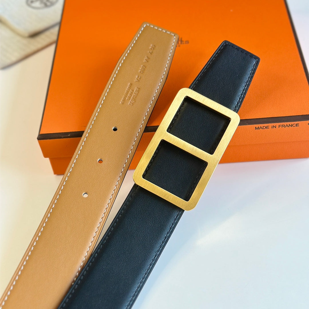 HERMES BELT BUCKLE & REVERSIBLE ORANGE PASTEL AND BLACK LEATHER STRAP 38MM GOLD HARDWARE