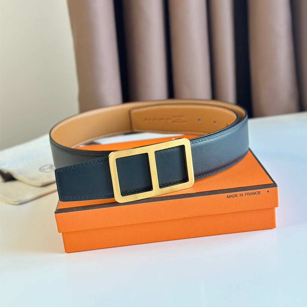 HERMES BELT BUCKLE & REVERSIBLE ORANGE PASTEL AND BLACK LEATHER STRAP 38MM GOLD HARDWARE