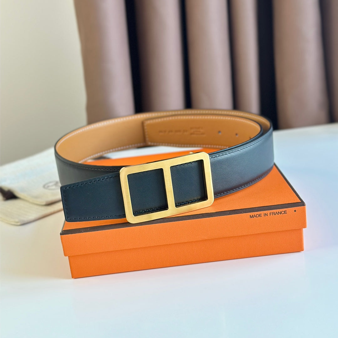HERMES BELT BUCKLE & REVERSIBLE ORANGE PASTEL AND BLACK LEATHER STRAP 38MM GOLD HARDWARE