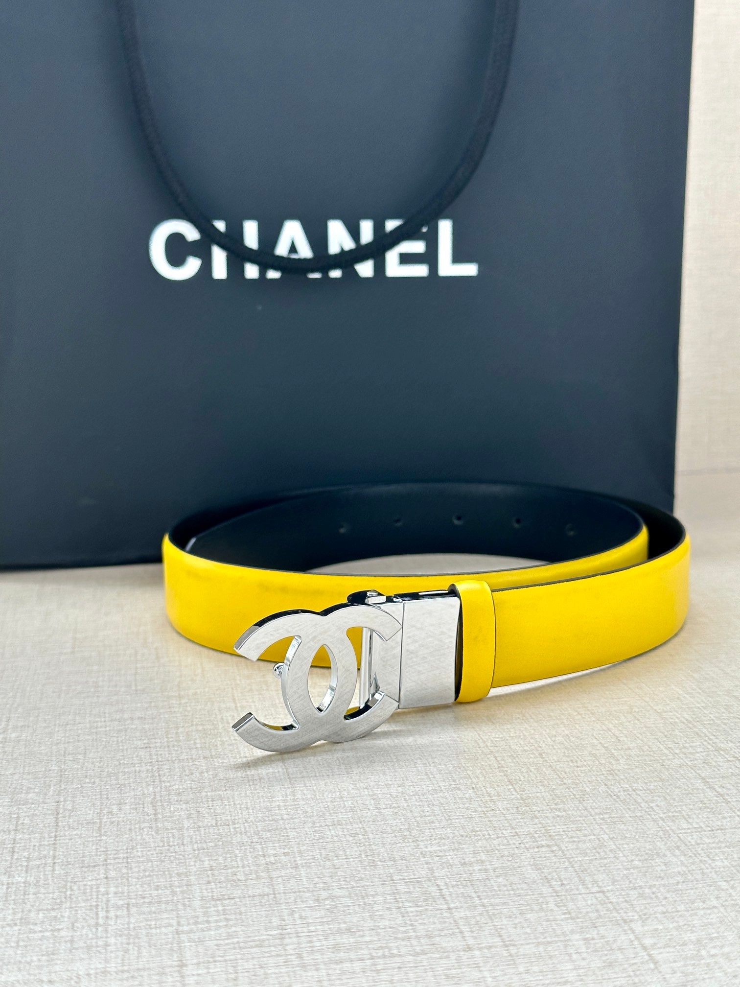 CHANEL 30MM BELT IN BRIGHT YELLOW AND BLACK CALFSKIN WITH SILVER HARDWARE