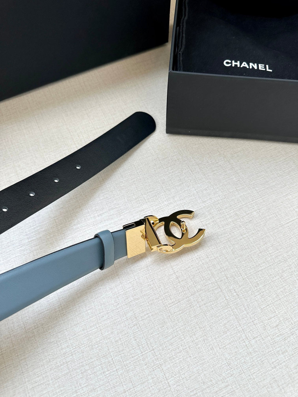 CHANEL 30MM BELT IN STONE BLUE AND BLACK CALFSKIN WITH GOLD HARDWARE