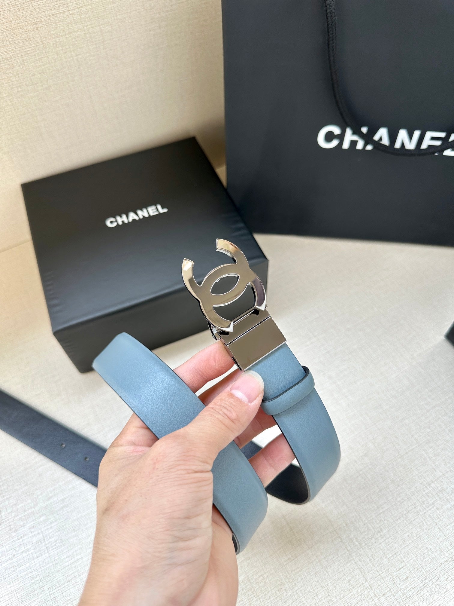 CHANEL 30MM BELT IN STONE BLUE AND BLACK CALFSKIN WITH SILVER HARDWARE