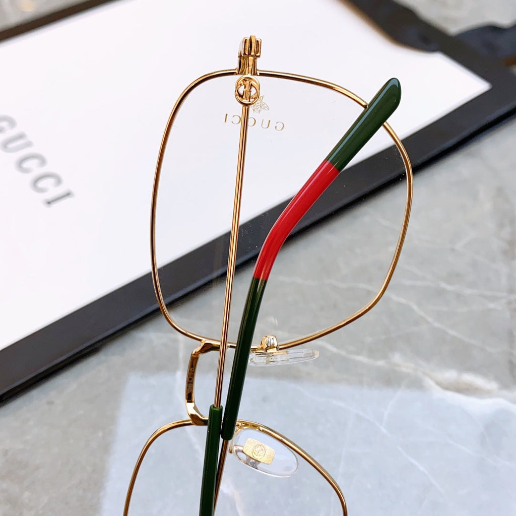 GUCCI SQUARE FRAME SUNGLASSES GG0396O IN METAL
