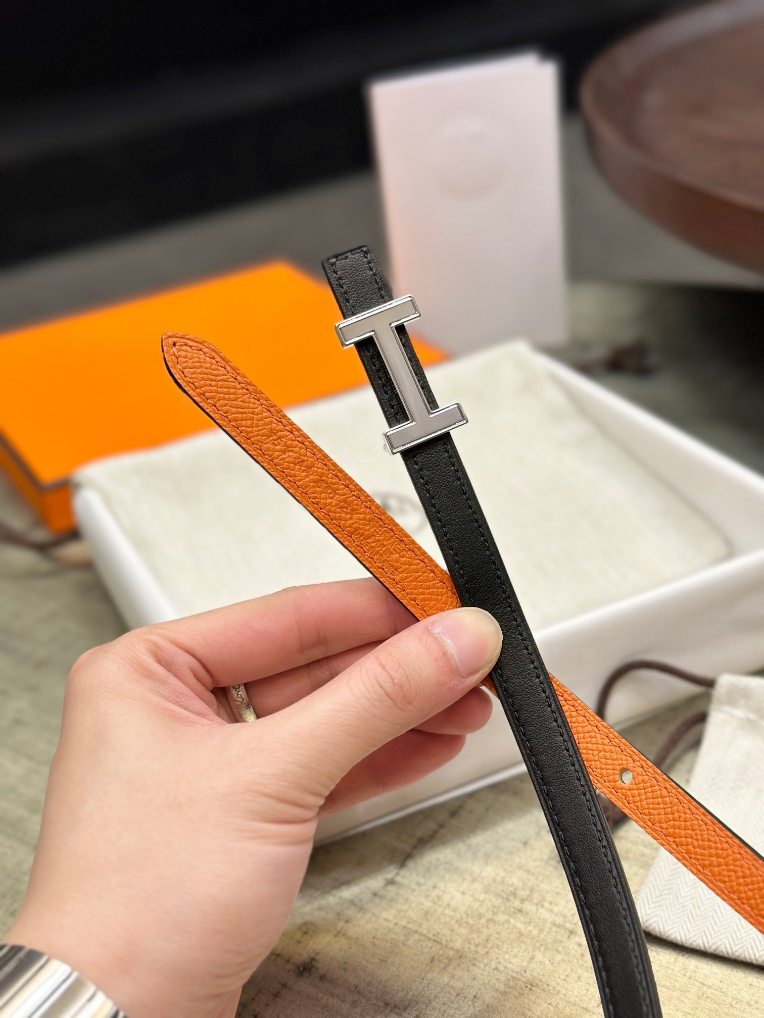 HERMES FOCUS BUCKLE & REVERSIBLE ORANGE AND BLACK LEATHER STRAP 13MM SILVER HARDWARE