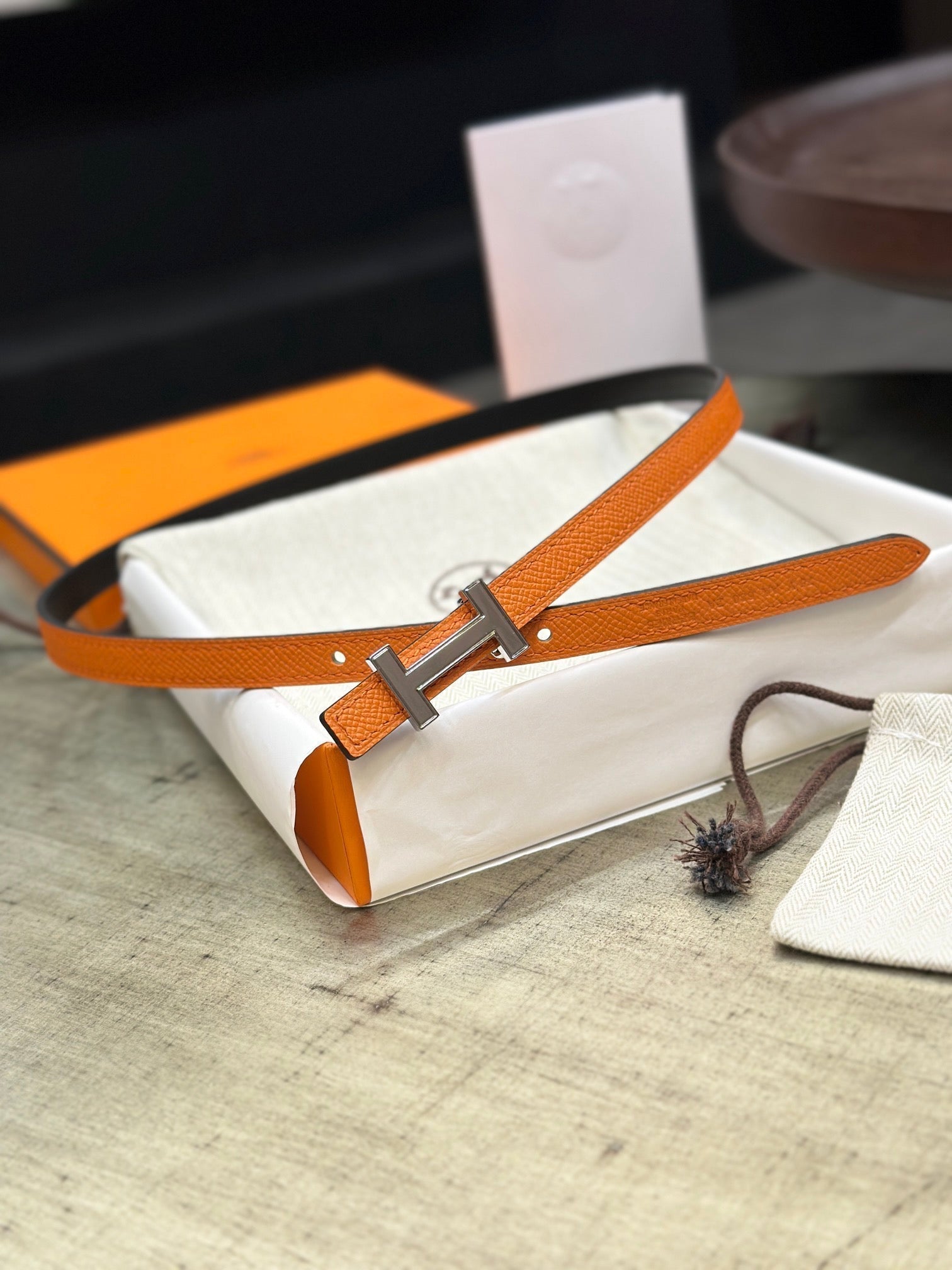 HERMES FOCUS BUCKLE & REVERSIBLE ORANGE AND BLACK LEATHER STRAP 13MM SILVER HARDWARE