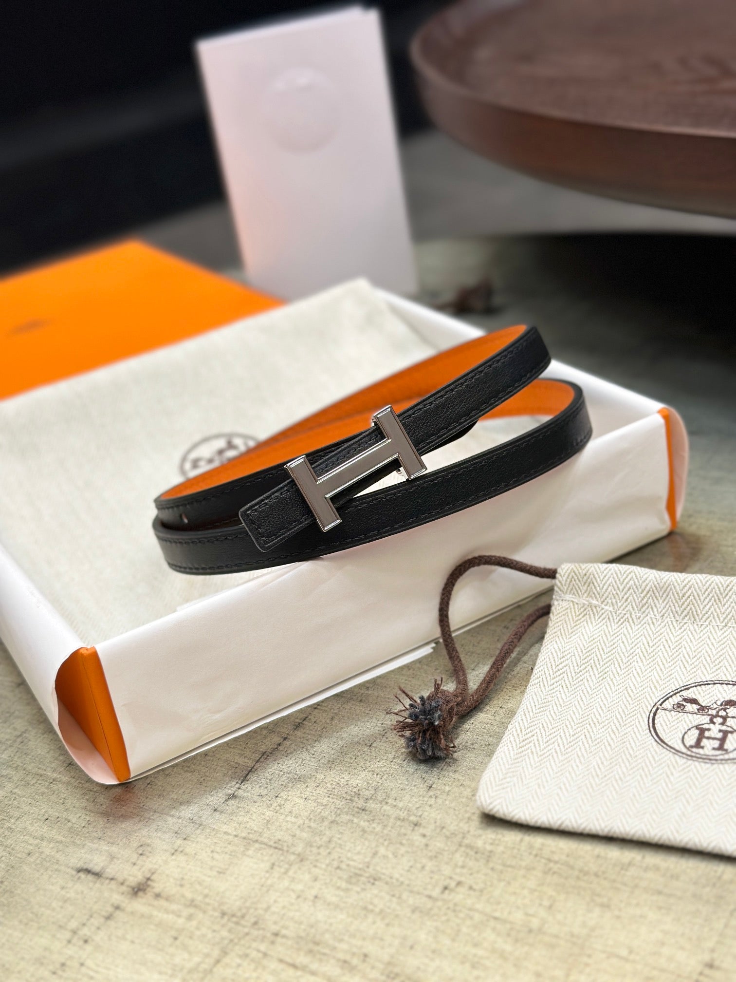 HERMES FOCUS BUCKLE & REVERSIBLE ORANGE AND BLACK LEATHER STRAP 13MM SILVER HARDWARE