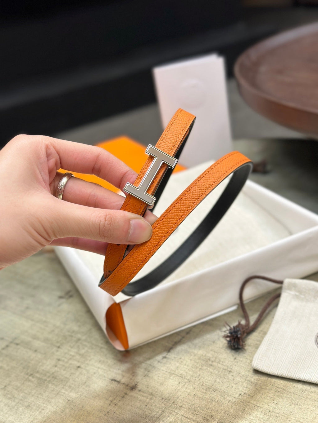 HERMES FOCUS BUCKLE & REVERSIBLE ORANGE AND BLACK LEATHER STRAP 13MM SILVER HARDWARE